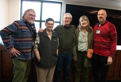 Hille pictured with current and retired employees